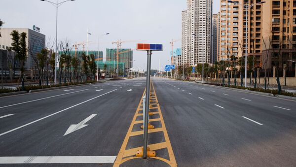 Una calle vacía de la ciudad de Yueyang, China - Sputnik Mundo