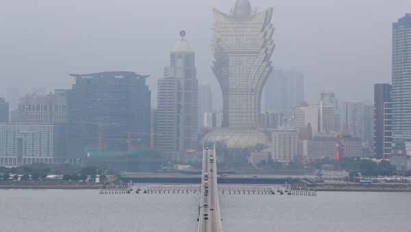 El smog en la ciudad de Macao, China (imagen referencial) - Sputnik Mundo