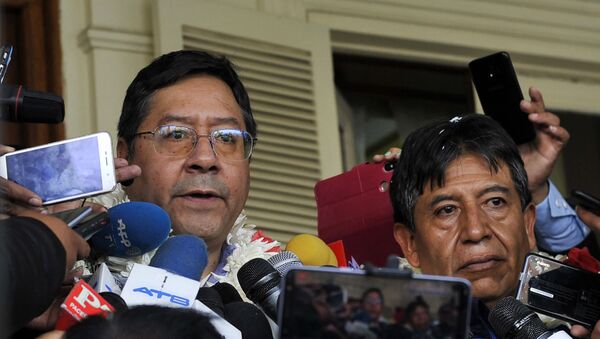 Los canditados a presidente y vicepresidente de Bolivia, Luis Arce y David Choquehuanca - Sputnik Mundo