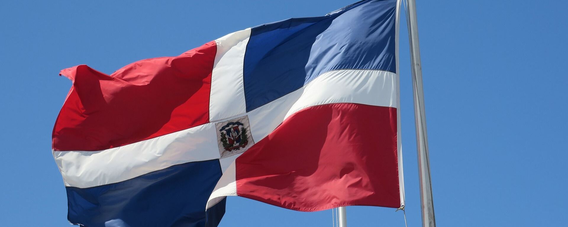 La bandera de la República Dominicana - Sputnik Mundo, 1920, 01.03.2022