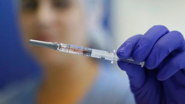 Una vacuna contra la influenza - Sputnik Mundo