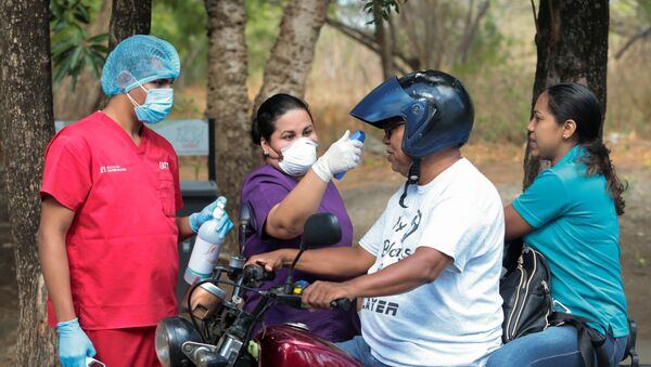 Revisión de la gente en Nicaragua para detescar si tienen coronavirus - Sputnik Mundo