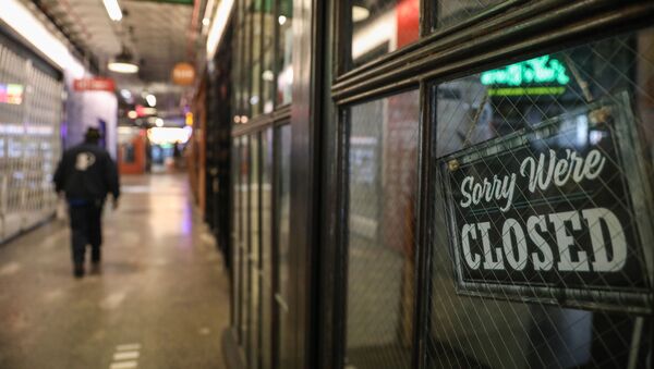 Una tienda cerrada en EEUU durante el brote de coronavirus - Sputnik Mundo