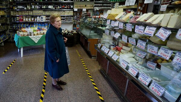 Una tienda en Italia, azotada por el coronavirus - Sputnik Mundo