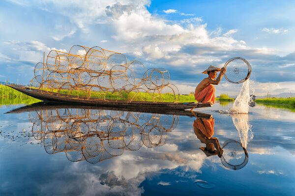 La foto 'Pescando', de un fotógrafo vietnamita, presentada en el concurso The World's Best Photos of #Water2020. - Sputnik Mundo