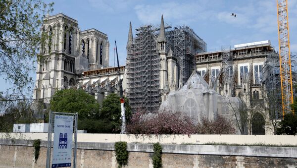 Restauración de la catedral Notre Dame de París en Francia tras el indendio - Sputnik Mundo