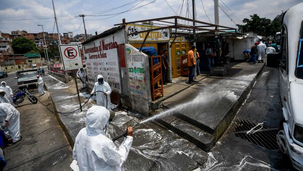 Trabajos de desinfección de las calles de Caracas, Venezuela - Sputnik Mundo