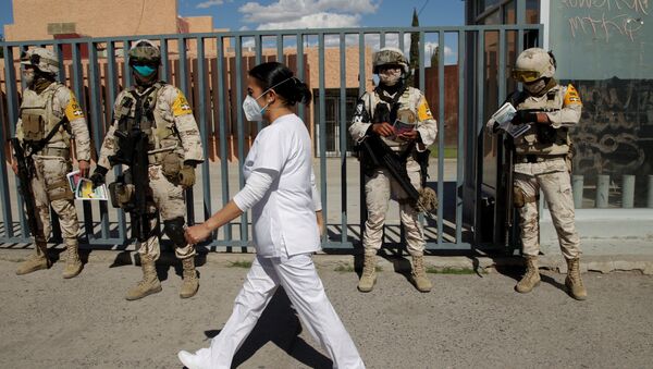 Enfermera en la Ciudad Juárez furante la pandemia de COVID-19 - Sputnik Mundo