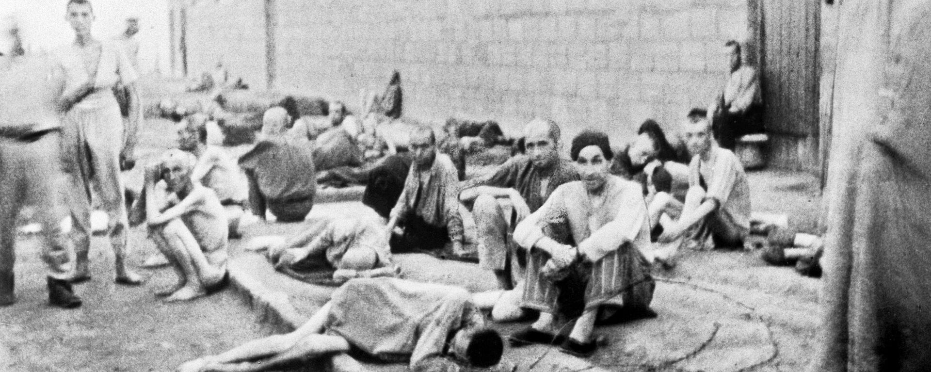 Los prisioneros del campo de concentración nazi de Mauthausen (archivo, 1945) - Sputnik Mundo, 1920, 29.06.2022