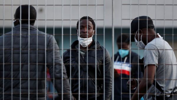 Migrantes en Italia - Sputnik Mundo