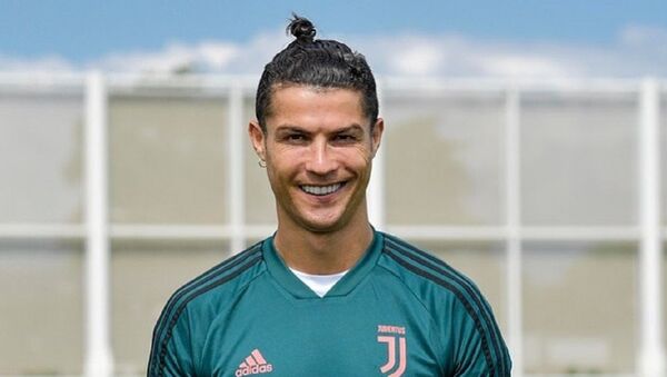 El futbolista Cristiano Ronaldo - Sputnik Mundo