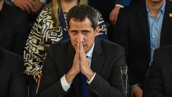 El líder de la oposición Juan Guaidó en un acto en Caracas - Sputnik Mundo