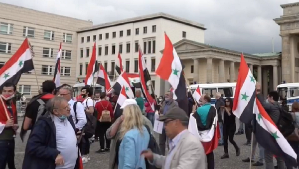 Protesta en Berlín, captura de pantalla - Sputnik Mundo