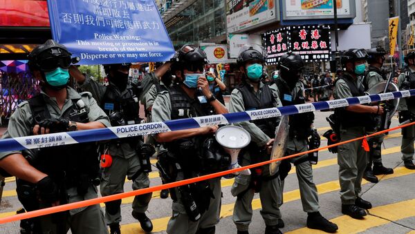 La Policía de Hong Kong durante las protestas - Sputnik Mundo