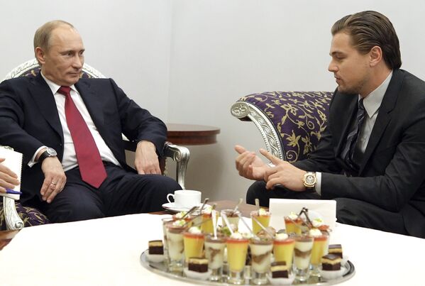 Vladímir Putin y Leonardo DiCaprio se reúnen en San Petersburgo - Sputnik Mundo