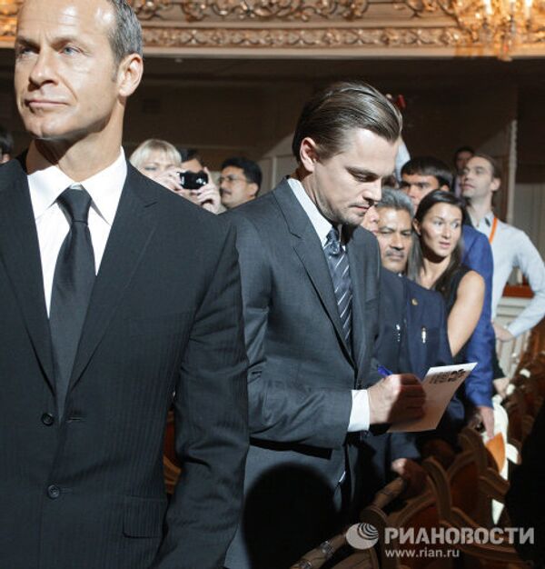 Vladímir Putin y Leonardo DiCaprio se reúnen en San Petersburgo - Sputnik Mundo