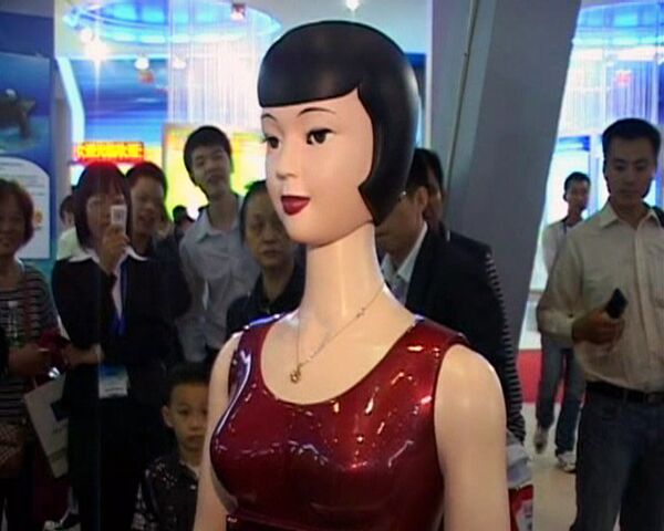 Robots chinos tocan piano y preparan comida en el microondas - Sputnik Mundo