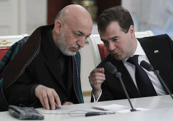 Los presidentes de Rusia y de Afganistán, Dmitri Medvédev y Hamid Karzai - Sputnik Mundo
