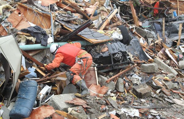 El número de muertos y desaparecidos por el terremoto en Japón supera 25.000 personas - Sputnik Mundo