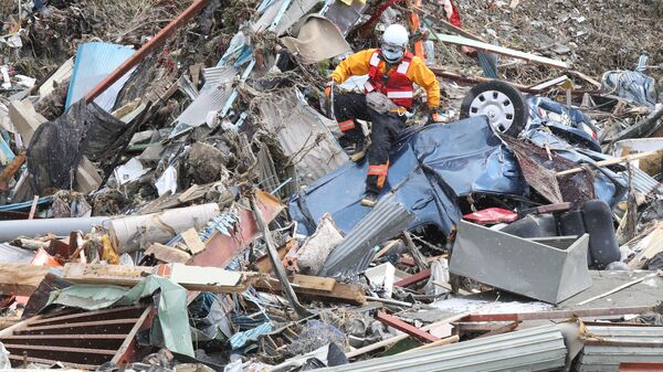 Asciende a 11.232 los muertos por terremoto y tsunami en Japón - Sputnik Mundo