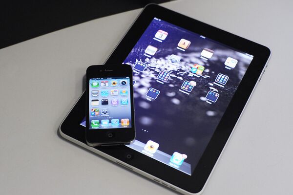 Apple iPhone y Apple iPad - Sputnik Mundo
