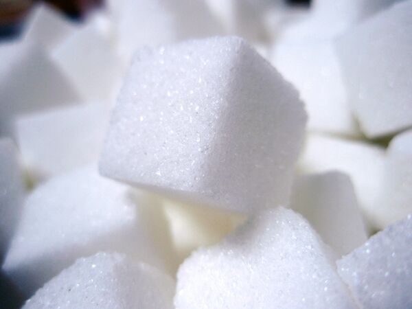 México y EEUU acuerdan suspender investigaciones antidumping contra exportaciones mexicanas de azúcar - Sputnik Mundo