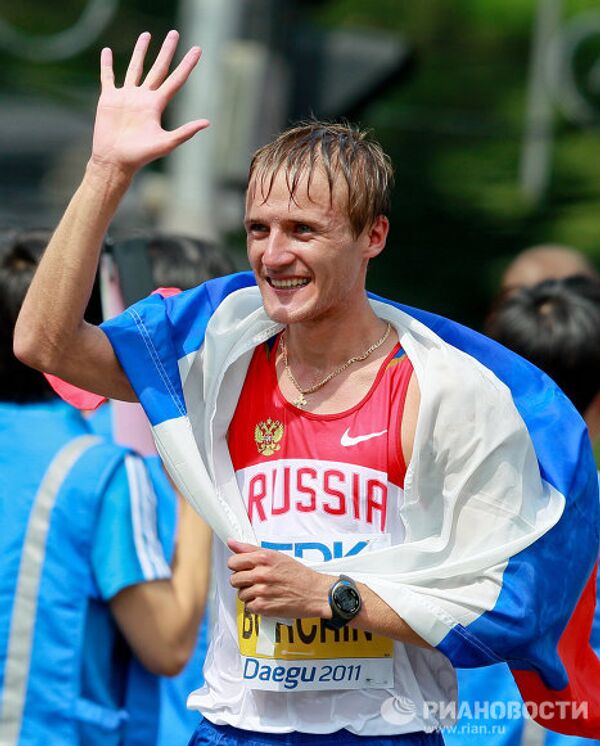 Oro y plata para Rusia en la marcha de 20 kilómetros en el Mundial de Atletismo 2011 - Sputnik Mundo