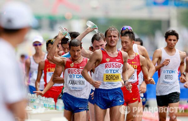 Oro y plata para Rusia en la marcha de 20 kilómetros en el Mundial de Atletismo 2011 - Sputnik Mundo