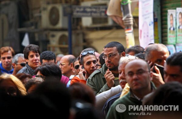 Colas para entrar en colegios electorales en El Cairo - Sputnik Mundo