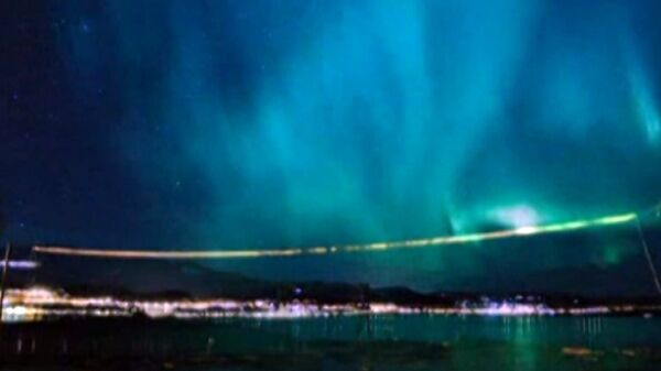 Aurora boreal en los cielos de Escocia y el norte de Inglaterra - Sputnik Mundo