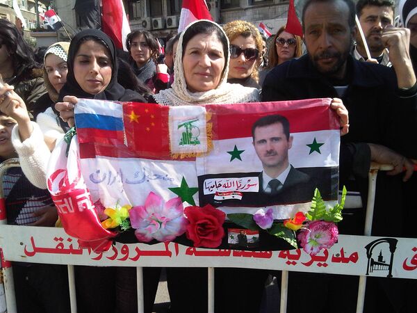 Ciudades sirias escenario de masivas manifestaciones en apoyo al presidente Bashar Asad - Sputnik Mundo