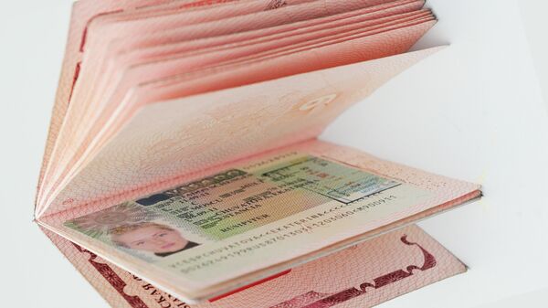Visado Schengen en el pasaporte de una ciudadana rusa (archivo) - Sputnik Mundo