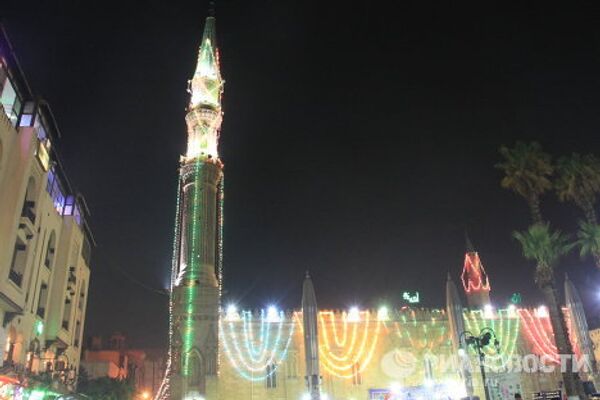 Festejos en El Cairo por el día del nacimiento del imán Husein - Sputnik Mundo