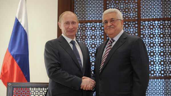 El presidente ruso, Vladímir Putin, y su homólogo palestino, Mahmud Abás - Sputnik Mundo