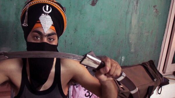 Los guerreros Sikhs saben masticar vidrio y partir cocos en la cabeza - Sputnik Mundo