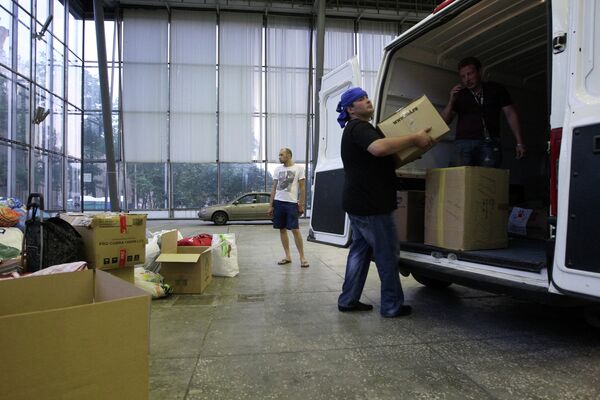 Krimsk recibió ayer unas 300 toneladas de ayuda humanitaria tras inundación de la semana pasada - Sputnik Mundo