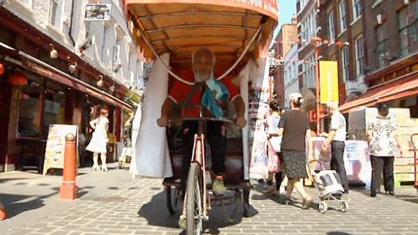 Chino viaja dos años en bicicleta para ver los JJOO en Londres - Sputnik Mundo