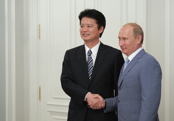 Koichiro Gemba y Vladímir Putin - Sputnik Mundo