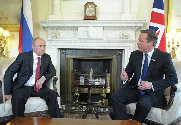 Vladímir Putin y David Cameron - Sputnik Mundo