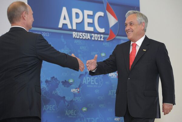 Vladímir Putin y Sebastián Piñera - Sputnik Mundo