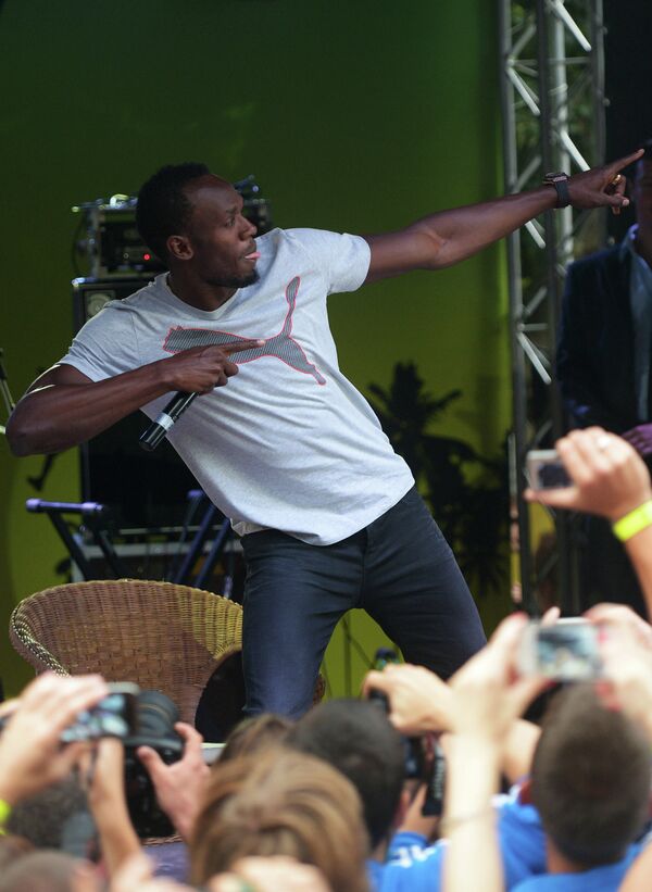 El pentacampeón mundial Usain Bolt en una fiesta jamaiquina en Moscú - Sputnik Mundo