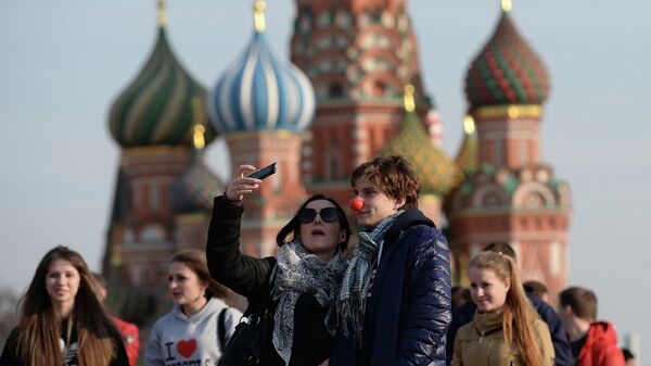 Turistas en la Plaza Roja (imagen referencial) - Sputnik Mundo