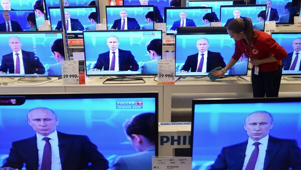 Televisores en una tienda moscovita - Sputnik Mundo