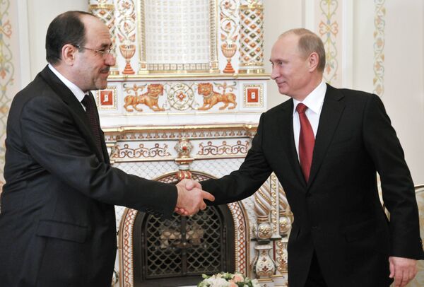 El primer ministro de Irak, Nuri al-Maliki, negociará nuevos contratos militares con el presidente ruso, Vladímir Putin, durante una reunión que sostendrán en China - Sputnik Mundo