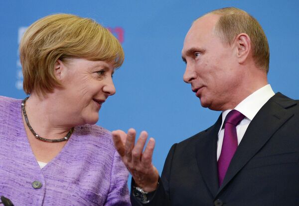 Сanciller de Alemania, Angela Merkel y presidente de Rusia, Vladímir Putin - Sputnik Mundo