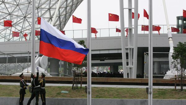 Bandera rusa en China - Sputnik Mundo