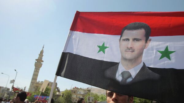 Mitin en apoyo a Bashar Asad en Damascus - Sputnik Mundo