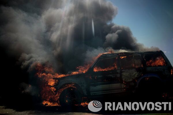 Incendios y proyectiles sin estallar en las calles de Lugansk - Sputnik Mundo
