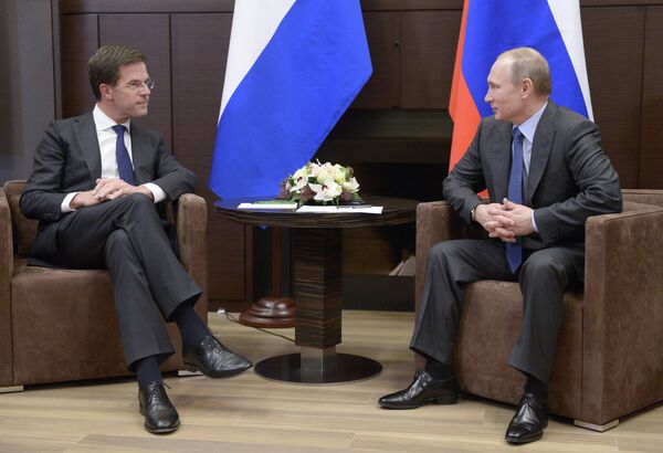 El primer ministro de los Países Bajos, Mark Rutte, y el presidente de Rusia, Vladímir Putin (Archivo) - Sputnik Mundo