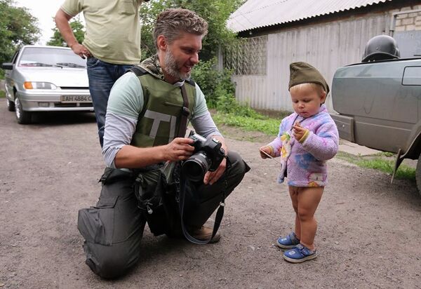 Andréi Stenin, fotógrafo de Rossiya Segodnya desaparecido en Ucrania - Sputnik Mundo